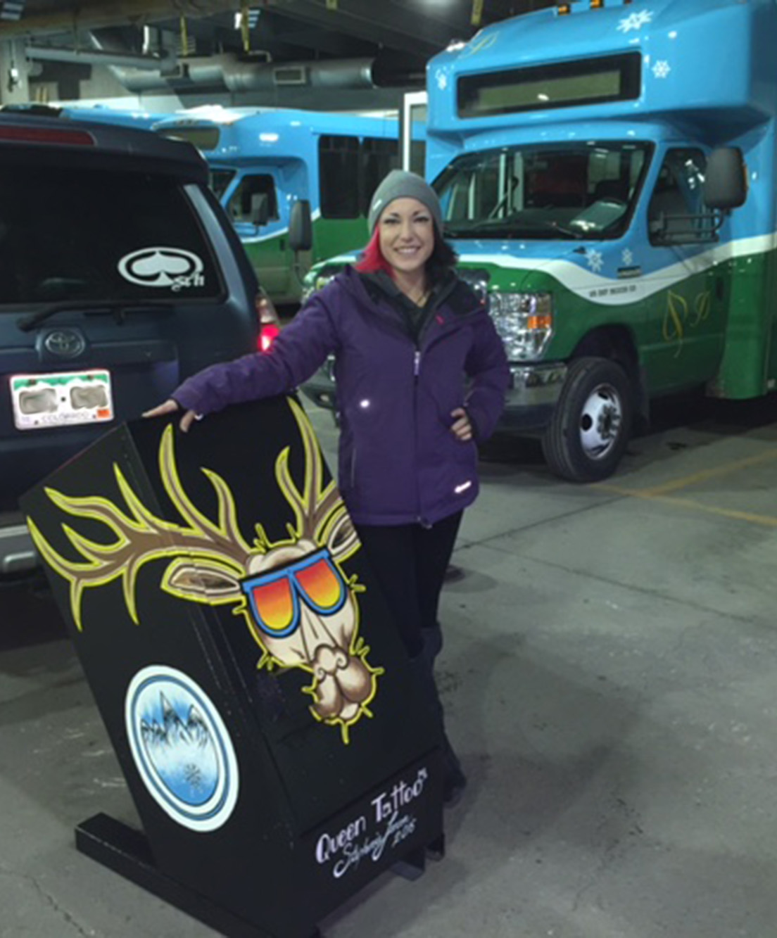 Woman with Queen Tattoo Display